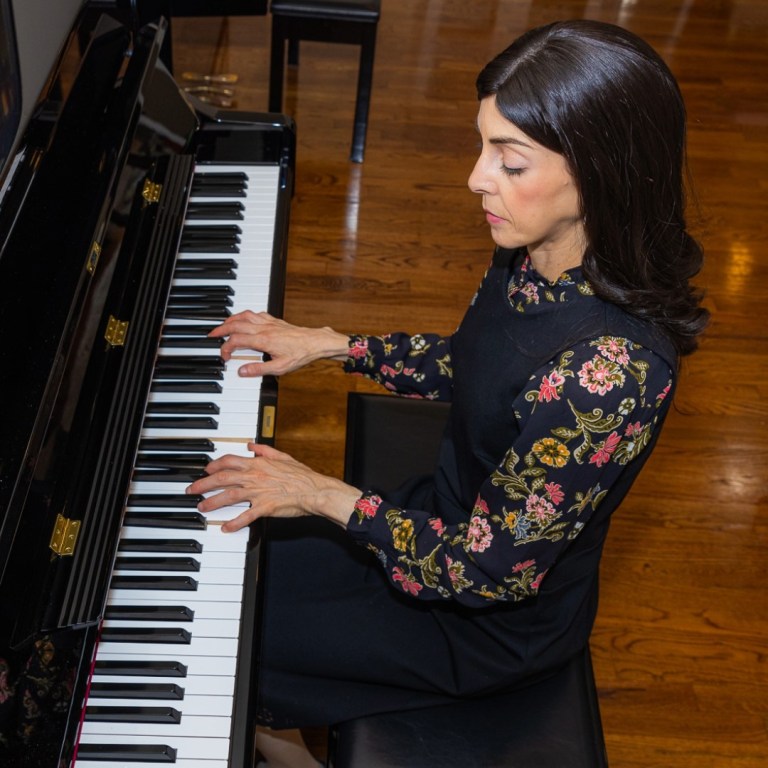 PIano-left-side-JPG Devorah playing the piano